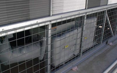 Reusable acoustic blankets reduce chiller noise for college classes