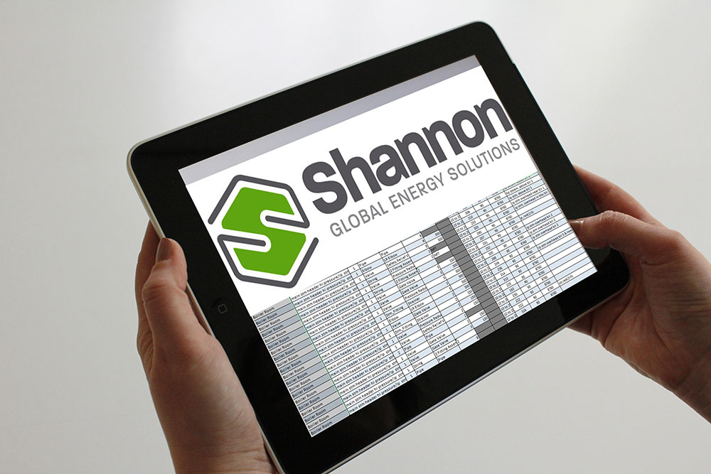 hands holding tablet with Shannon Energy Survey on screen