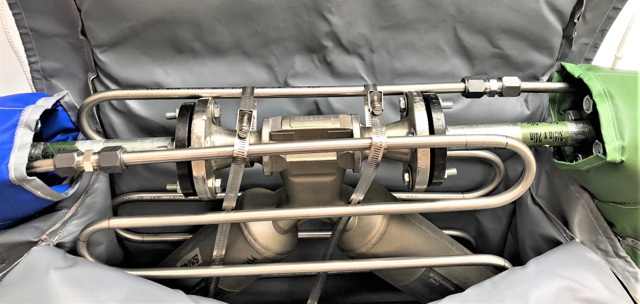 Freeze Protection Steam Heat Kit showing prebent custom tubing around equipment with accompanying insulation blanket