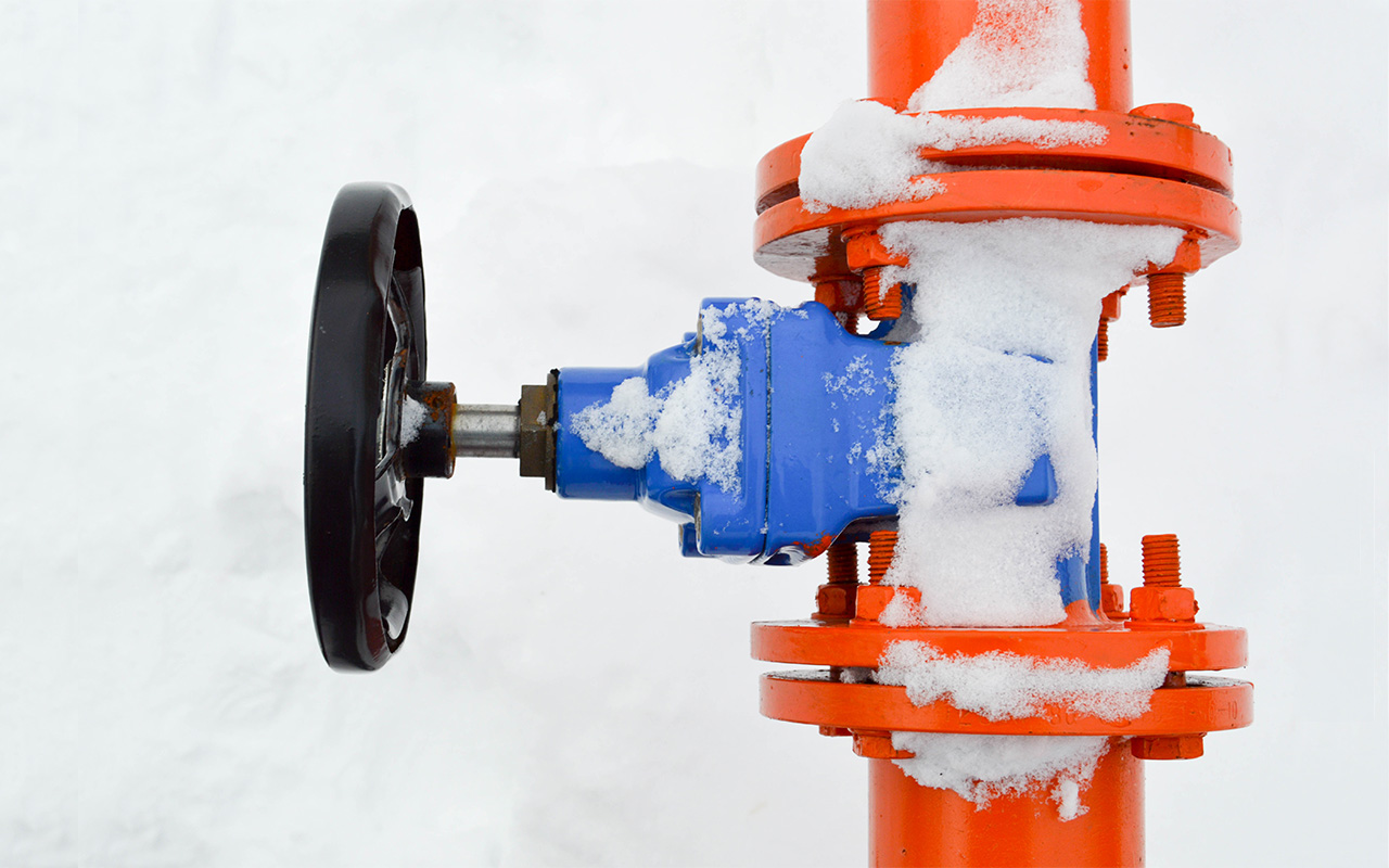 Snow Freeze Valve blue pipeline orange 2100 x 800 Blog image Need Freeze Protection -Bare Valve with Snow & Cold